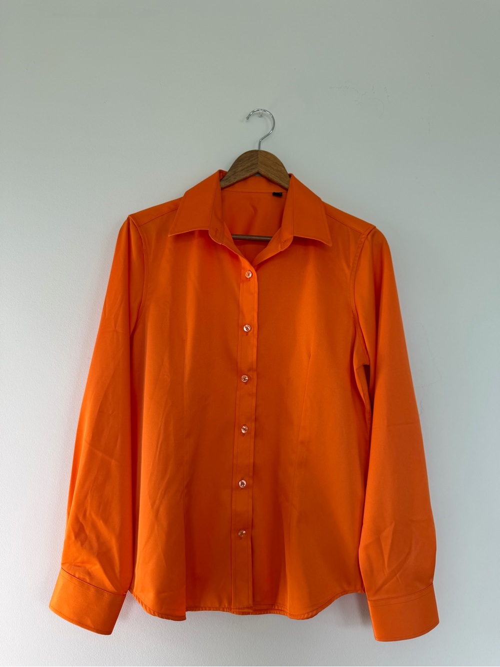 Designed in Italy, Woman’s Orange Button-Up Shirt. Size Medium
